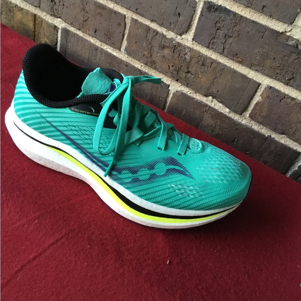 Saucony Women's Teal and Black Running Shoe with Neon Accent
